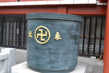 Buddhist sign in front of a temple in Asakusa, Tokyo