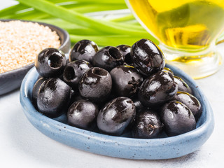 black olives in blue plate