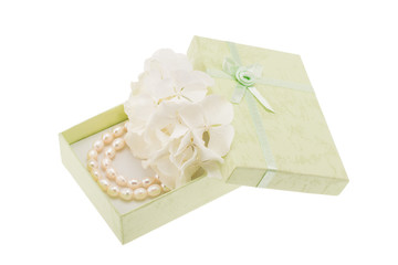 White hydrangea and gift box with pearls