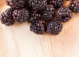 Fresh berry blackberry with green mint leaves isolated