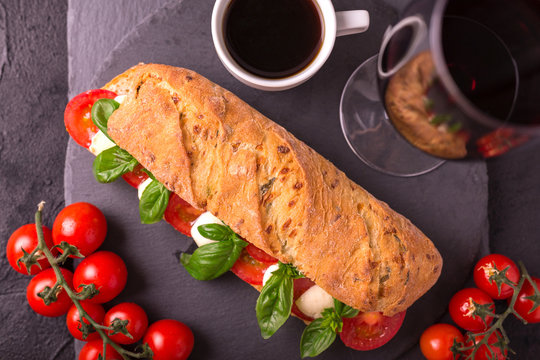 Ciabatta Sandwich With Caprese Salad With Wine And Coffee.