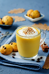 Pumpkin spice latte with whipped cream and pumpkin chocolate chips cookies