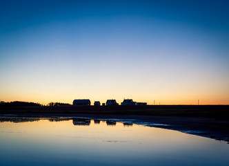 Naklejka premium reflection of house and barn