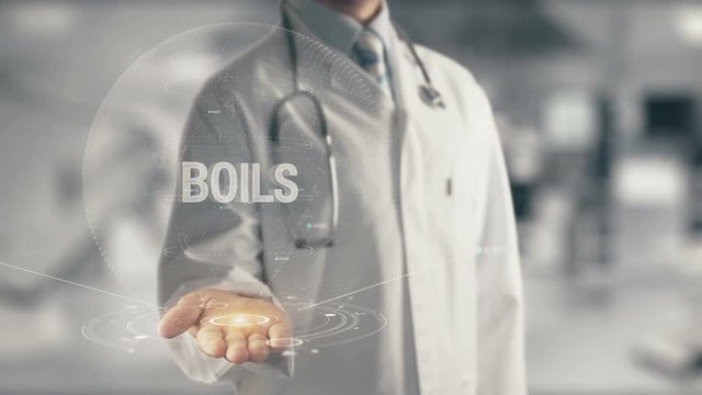 Doctor holding in hand Boils