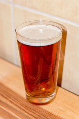 Glass of Amber Ale beer.
