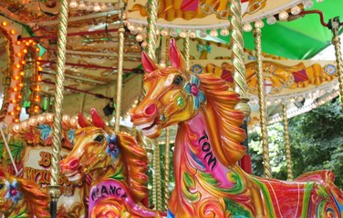 carousel merry-go-round painted horses ride - Stock Photo © cheekylorns