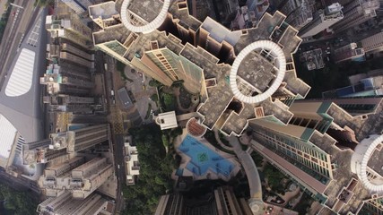 Hong Kong Aerial v176 Flying low over condominium complex buildings looking down vertically - Powered by Adobe