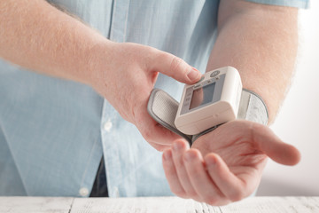 Health care for men with rhythm and blood pressure monitor