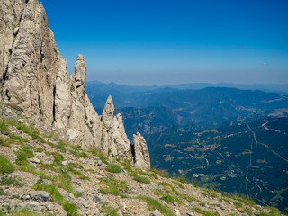 Stone pillars and valley below