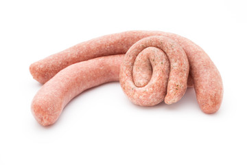 Raw sausages with herbs and spices.