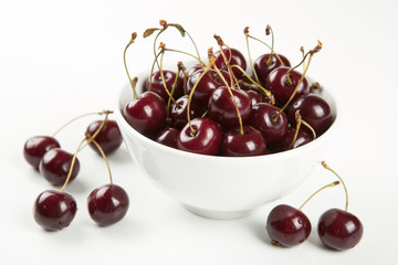 Still life of ripe sweet cherry on white background
