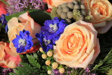 Pink roses and blue larkspur