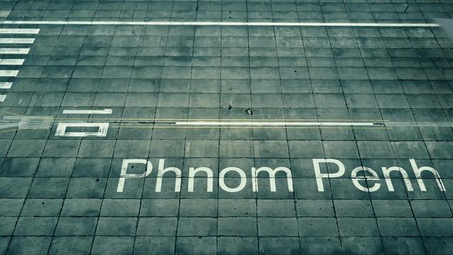 Aerial view of big airplane arriving to Phnom Penh airport. Travel to Cambodia conceptual intro animation