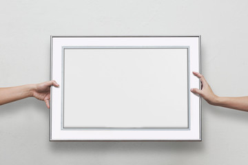 Many men's hand framed the picture with the concept of harmony.