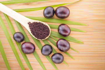 Fruits and acai powder originating from the Amazon  (Euterpe oleracea)