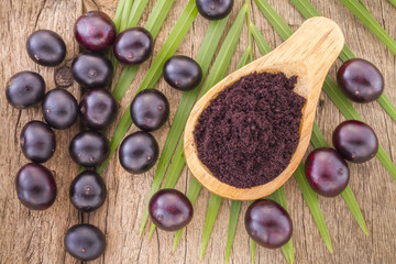 Fruits and acai powder originating from the Amazon  (Euterpe oleracea)