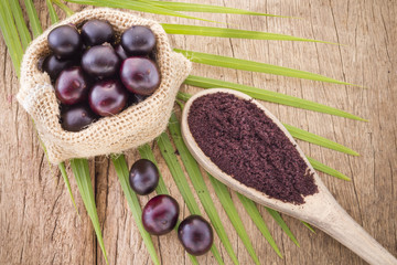 Fruits and acai powder originating from the Amazon  (Euterpe oleracea)
