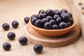 Fruits and acai powder originating from the Amazon  (Euterpe oleracea)