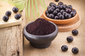 Fruits and acai powder originating from the Amazon  (Euterpe oleracea)