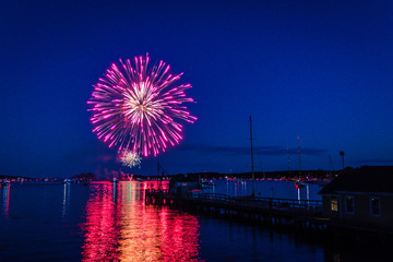 Boothbay Harbor fireworks reflected in the water on the Fourth of July