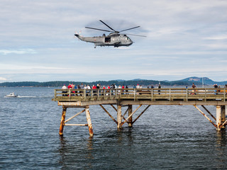 Fototapeta na wymiar Helicopter crew performing water rescue training