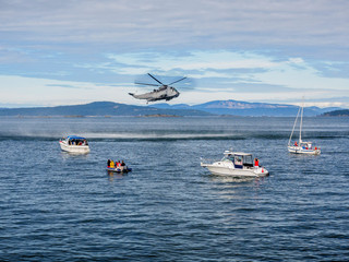 Helicopter crew performing water rescue training