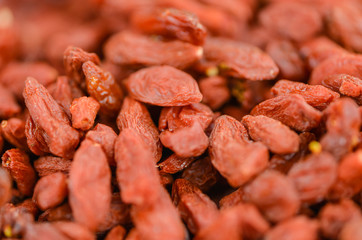 Goji Berries (dried) on vintage wooden background