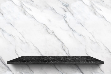 Empty black marble shelf at white marble wall background,Mock up for display or montage of product or design