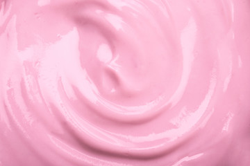 close up the pink creamy homemade blueberries or strawberries yogurt texture background