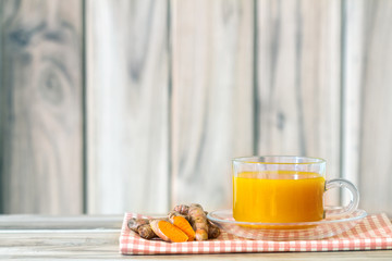 a cup of Turmeric Tea , Benefits for reduce Inflammation , Liver Detox and Cleanser healthy herb drink concept