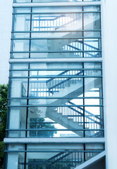 Metal and glass stairs in the building modern style