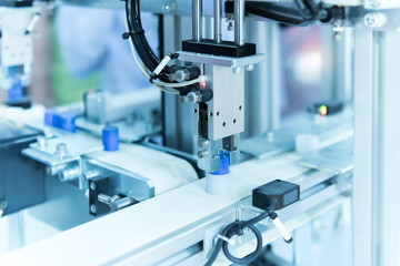 robotic arm machine tool at industrial manufacture plant,Smart factory industry 4.0 concept.