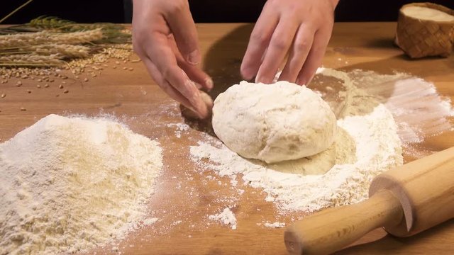 Yeast dough rolled on a rolling pin