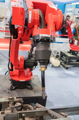 Industrial robotic arm for welding.