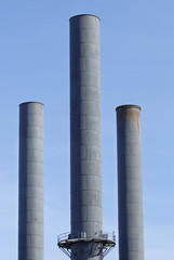 Smoke stacks from an industrial plant