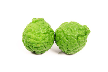 Kaffir lime and kaffir lime leaf on white background