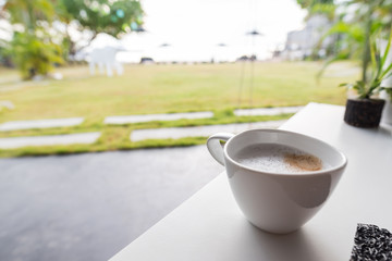 coffee with blurred nature background