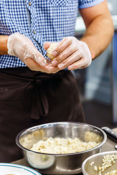 chef making arancini
