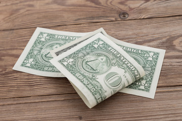 dollar money on wooden table