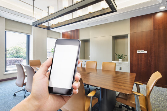 mobile phone in modern meeting room
