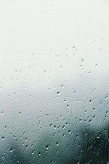 Dirty glass of raindrops