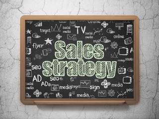 Advertising concept: Sales Strategy on School board background