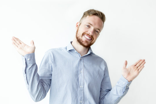 Smiling Young Attractive Man Spreading Hands