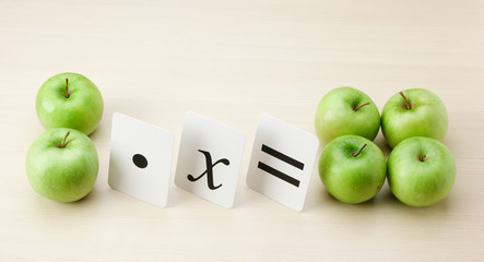 School card and apple with math problems