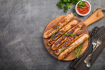 Grilled sausages with sauce