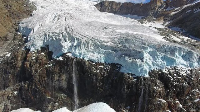 Front of glaciers whit big waterfall - Aerial view with drone