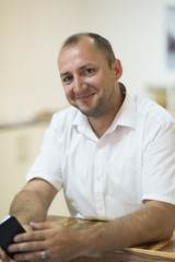 designer in his furniture manufacturing workshop