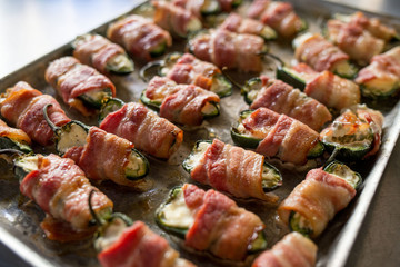 Jalapenos wrapped in bacon