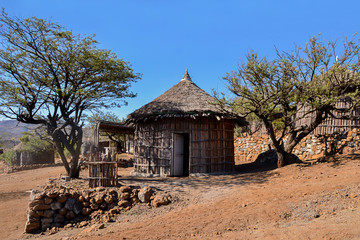 Typical rounded Djiboutian huts in a village in northern Djibouti, Day Forest National Park (...