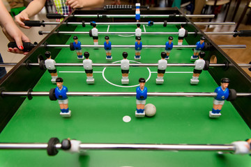 People playing in table football